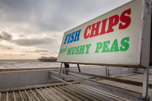 Sign At Brighton Pier For Fish And Chips