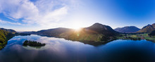 Panoramic Shot Of Lake Schliersee With Mangfall Mountains Against Sky, Bavaria, Germany