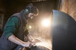 © Westend61 - Man grinding knives in a workshop