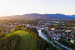 © Westend61 - Aerial view of Calvary hill and Isar river against sky, Isarwinkel, Upper Bavaria, Bavaria, Germany