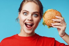 Young Woman With Hamburger