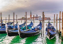 Gondolas On Water In Venice, Italy. With Church Of San Giorgio Maggiore In The Background. 
