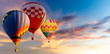 Beautiful landscape hot air balloons flying over sky at sunset