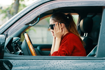 young woman in car