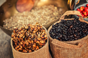 Wall Mural - Robusta, Arabica, coffee berries, coffee beans. Top view with copy space for your text