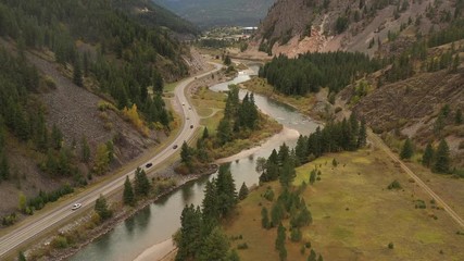 Wall Mural - Road Along River through Mountains