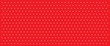 White small dots on red background. Polka dot seamless pattern. 