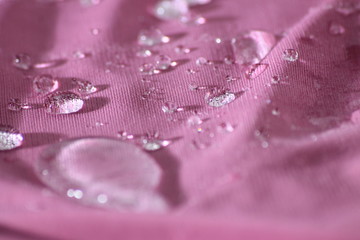  water splashes drops pink background