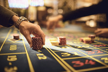 A Player Plays Roulette In A Casino.
