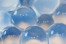 Abstract Texture, Blue Crystalline Balls Of Hydrogel For The Background. Hydrogel Beads. Close Up And Out Of Focus.
