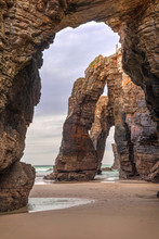 Natural Stone Archs On Playa De Las Catedrales (Beach Of The Cathedrals), Galicia, Spain