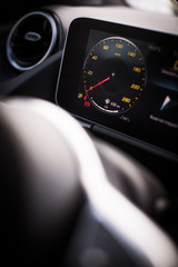 Wall Mural - Digital speedometer on a modern car dashboard