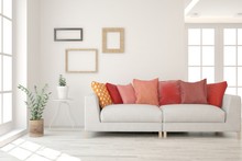 Stylish Room In White Color With Sofa And Red Pillows. Scandinavian Interior Design. 3D Illustration