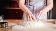 © conssuella - chef kneads baking dough, dirty chef hands in pastry, cooking, bakery concept