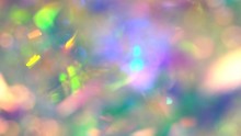 Blurred Real Glitter Texture. Abstract Holographic Background. Blue Pink Purple Neon Pastel Spectrum Gradient