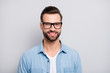© deagreez - Closeup photo of amazing friendly business guy perfect neat appearance hairstyle young promoted boss chief wear specs casual denim outfit isolated grey color background