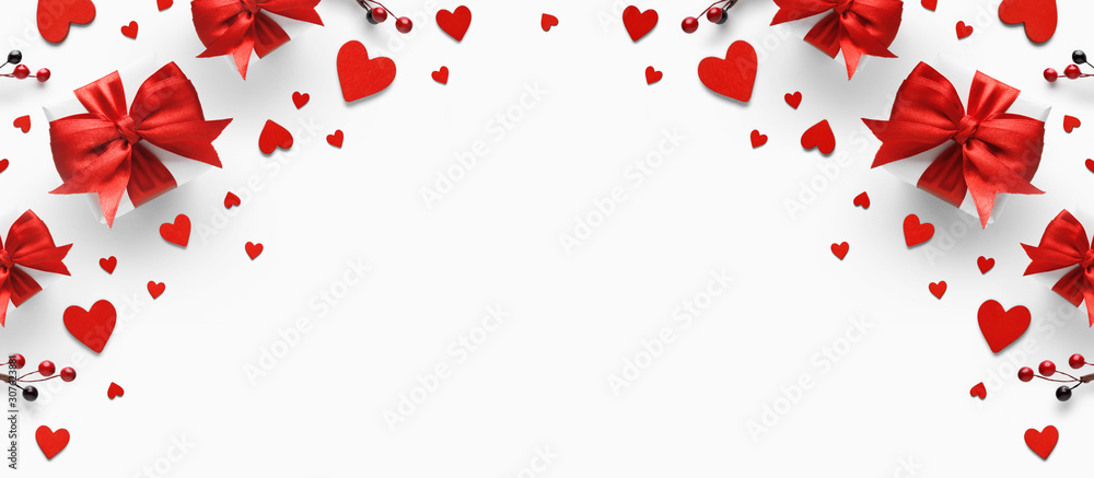 Gifts with red satin bow and hearts. - obrazy, fototapety, plakaty 
