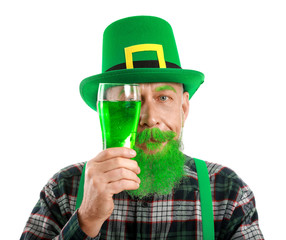 Funny mature man with glass of beer on white background. St. Patrick's Day celebration