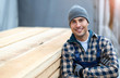 © pikselstock - Young male worker in timber warehouse