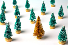 Christmas Pattern Made With Many Green And One Gold Pine Trees. Winter, Christmas, New Year Concept.