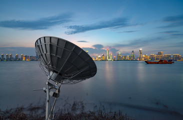 Wall Mural - Satellite antenna in the tall buildings of the city