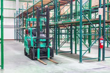 Wall Mural - Forklifts with rack and shelf inside warehouse 