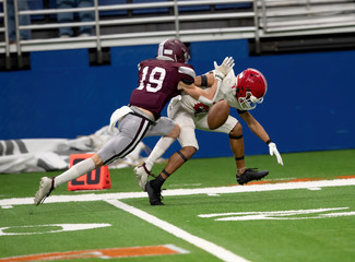 Great action photos of high school football players making amazing plays during a football game