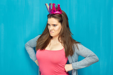 Wall Mural - Young woman with big breast wearing pink crown.