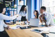© BullRun - Businesswoman talking to employees on conference