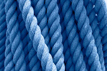 Trend Color 2020 Classic Blue, Top View, Layout For Design. Vintage Skein Of Rope On A Ship. Cable Rope Texture, Layout For Design. Material For Scenery Of Interest. Ship Props, Marine Subjects.
