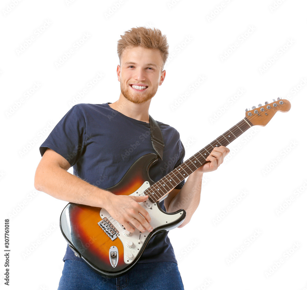 Handsome man playing guitar on white background