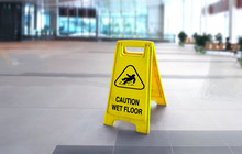 Caution Wet Slippery Floor Sign In The Building