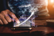 © prirach - Global financial chart Show the increased revenue in 2020, floating above the digital screen, smart phones, business people Future business growth ideas.Element of this image furnished by Nasa