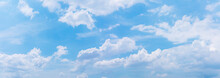 Panorama Or Panoramic Photo Of Blue Sky And White Clouds Or Cloudscape.