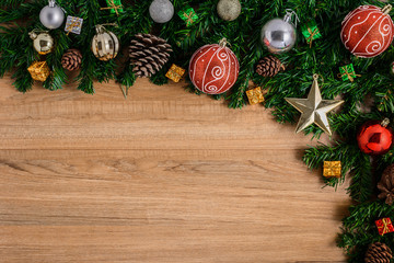 Wall Mural - Christmas fir tree with decoration on wooden board