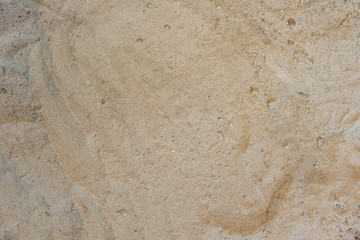 Beach sand texture background closeup