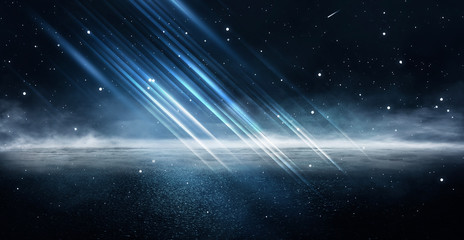 Wall Mural - empty night nature scene. the night starry sky, the rays of the blue neon spotlight. snowy winter ni