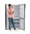 © New Africa - Man near empty refrigerator on white background