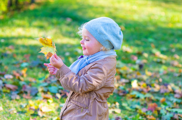 happy girl walking in autumn Park