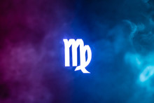 Blue Illuminated Virgo Zodiac Sign With Colorful Smoke On Background