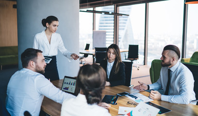 Female boss criticizing male employee