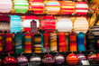 © pixarno - Closeup of colorful candles for sale at the christmas market