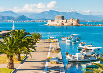 Nafplio city sea promenade and Bourtzi fortress on small island in Greece