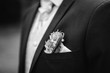 © Dennis - groom wearing a boutonniere