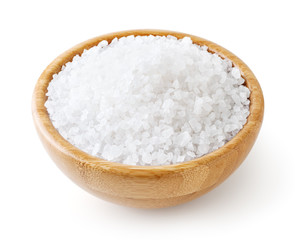 Sea salt in wooden bowl isolated on white background with clipping path