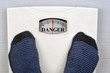 Weight scale showing danger