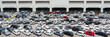 Hundreds of cars parked in a large parking lot. The only vacant parking space in parking lot. Parking place