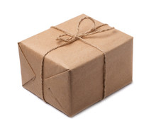 Brown Paper Parcels Ready To Be Shipped Brightly Lit On Isolated White Background.