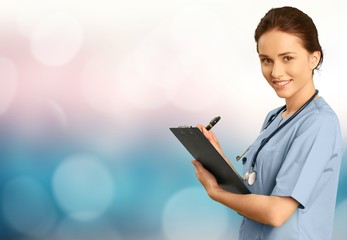 Wall Mural - Attractive young female doctor  on background