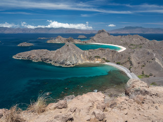 Wall Mural - Indonesia, november 2019: Padar Island near Komodo Island, Indonesia. Beautiful paradise island hiking to the top and seeing the view all over the bays of the island in archipelago